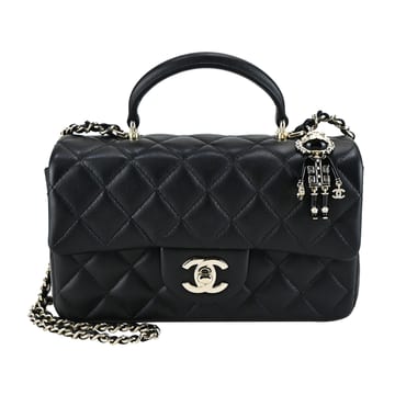 【CHANEL 香奈兒】Mini Flap Handle經典菱格紋小羊皮小獅子掛飾兩用包(黑色)